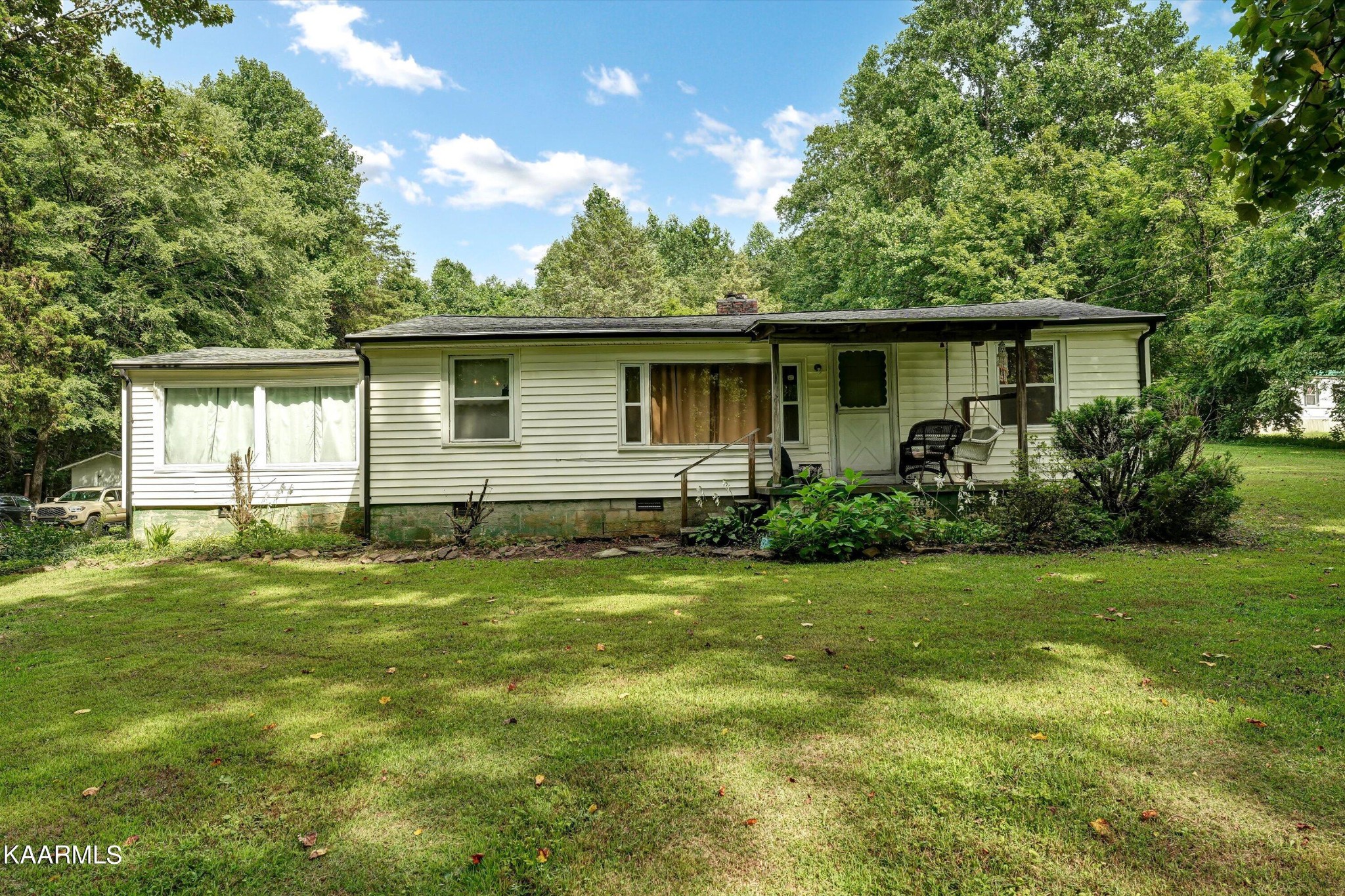 185 Moody Hollow Road Powell, TN 37849 - Photo 1 of 46 a front view of house with yard and green space