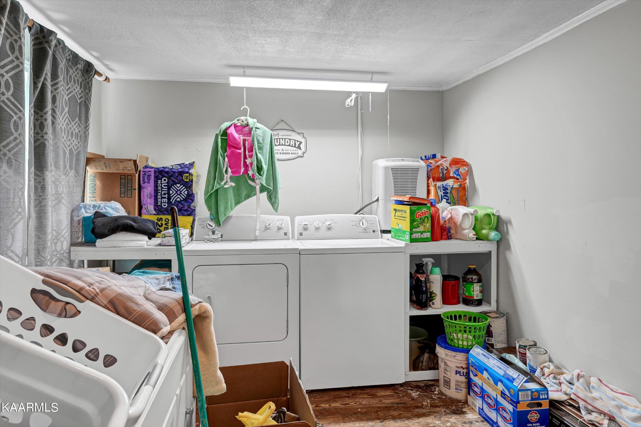 185 Moody Hollow Road Powell, TN 37849 - Photo 12 of 46 a storage room with washer and dryer