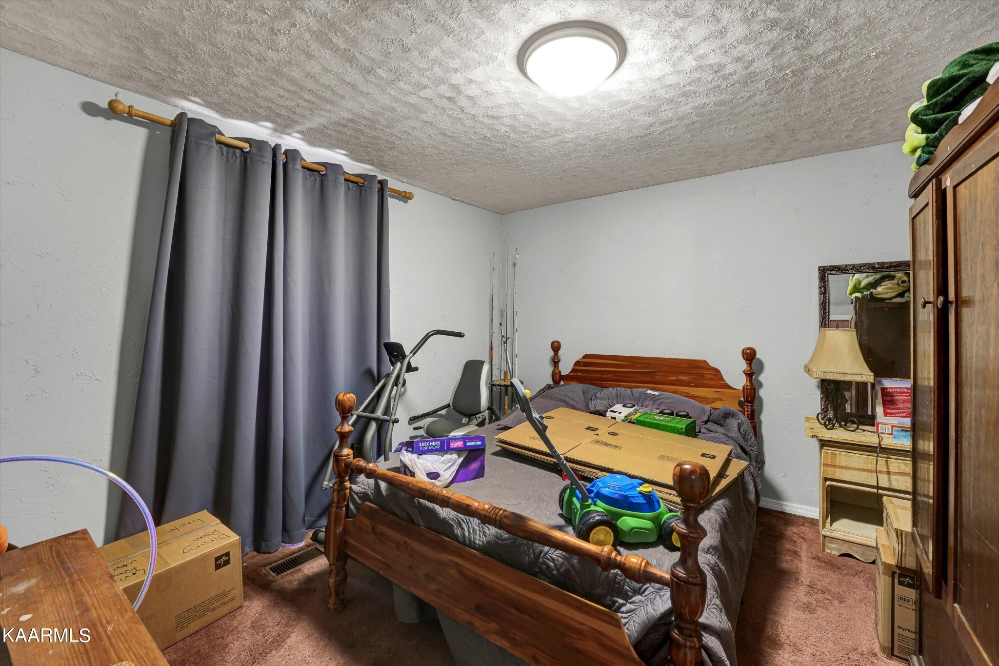 185 Moody Hollow Road Powell, TN 37849 - Photo 15 of 46 a bedroom with a bed and a window