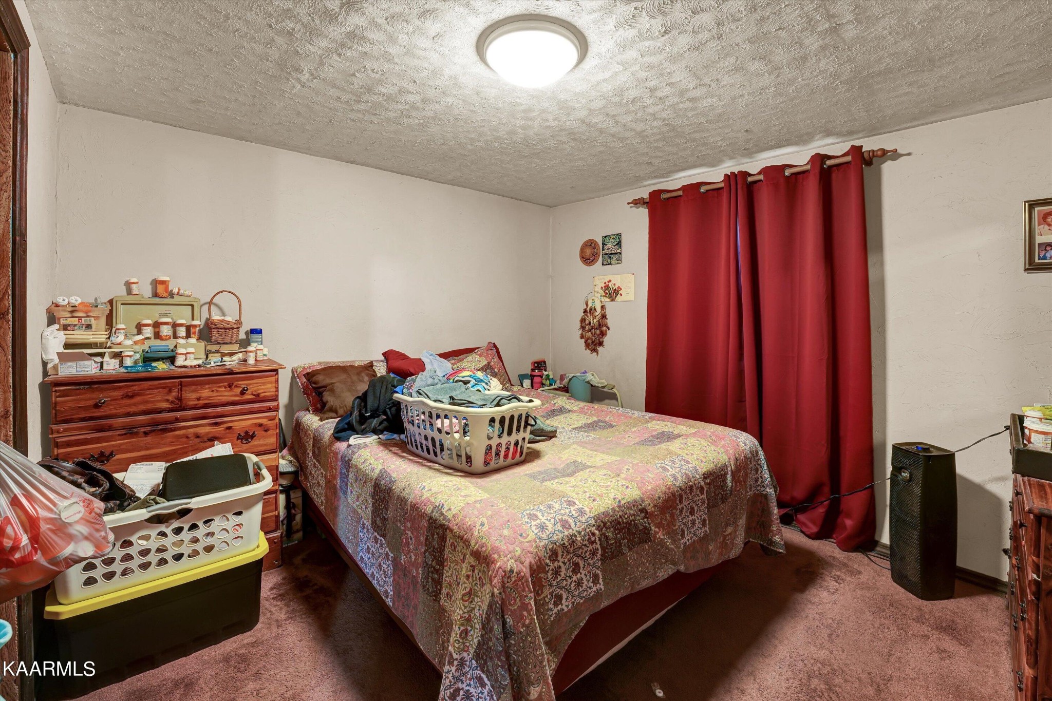 185 Moody Hollow Road Powell, TN 37849 - Photo 16 of 46 a bedroom with bed and a window