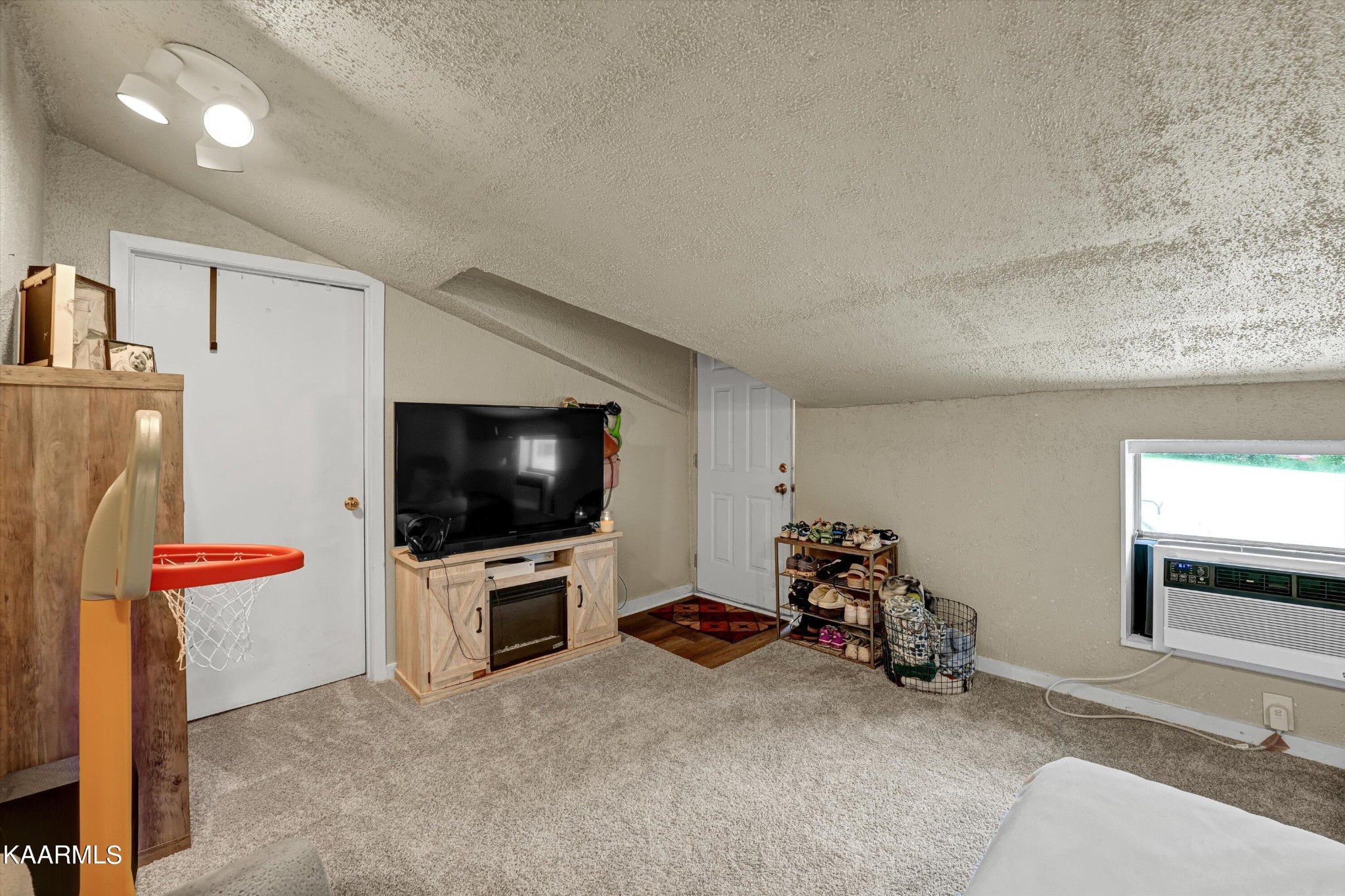 185 Moody Hollow Road Powell, TN 37849 - Photo 24 of 46 a living room with furniture and a flat screen tv