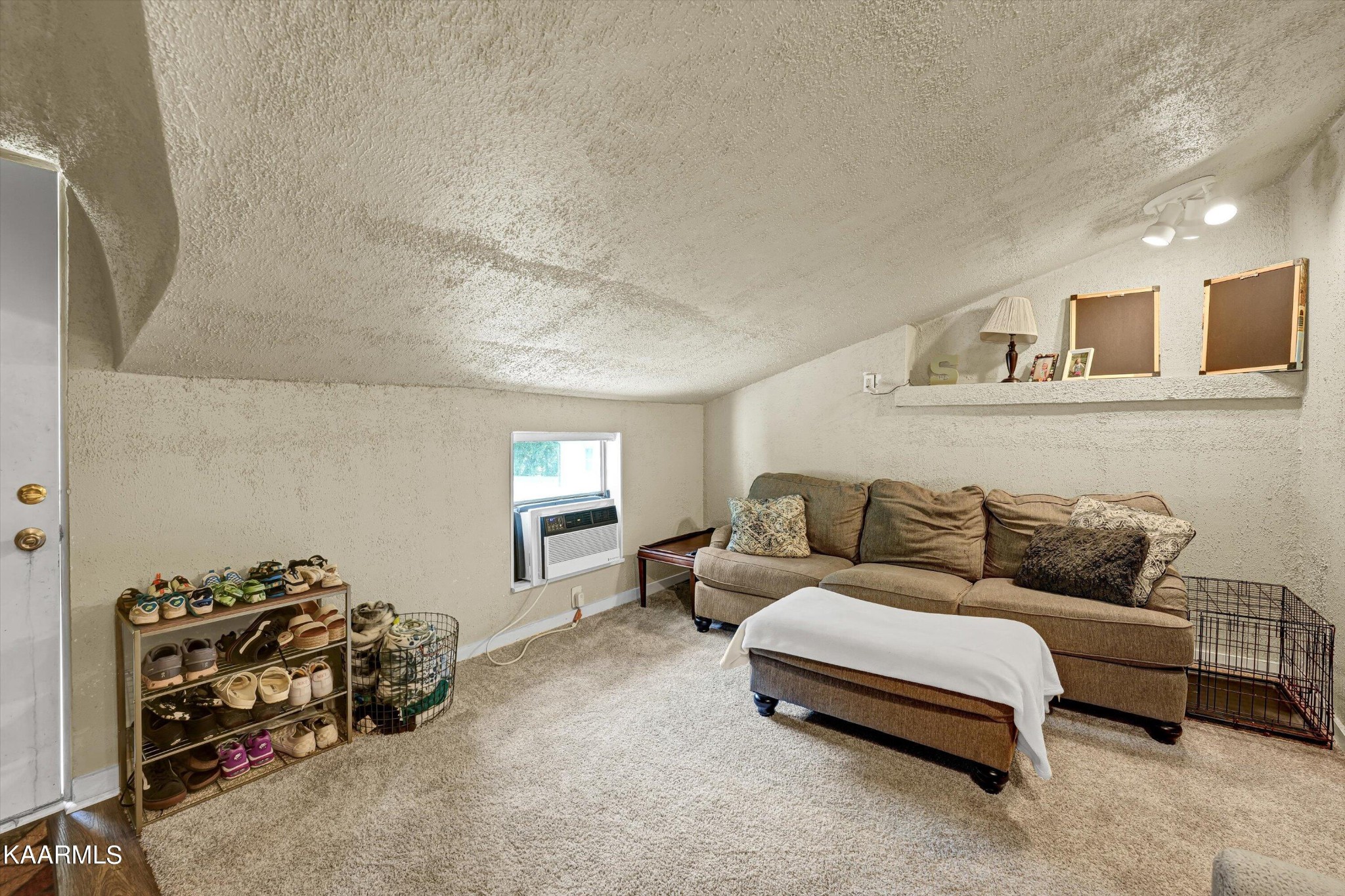 185 Moody Hollow Road Powell, TN 37849 - Photo 25 of 46 a living room with furniture and a window