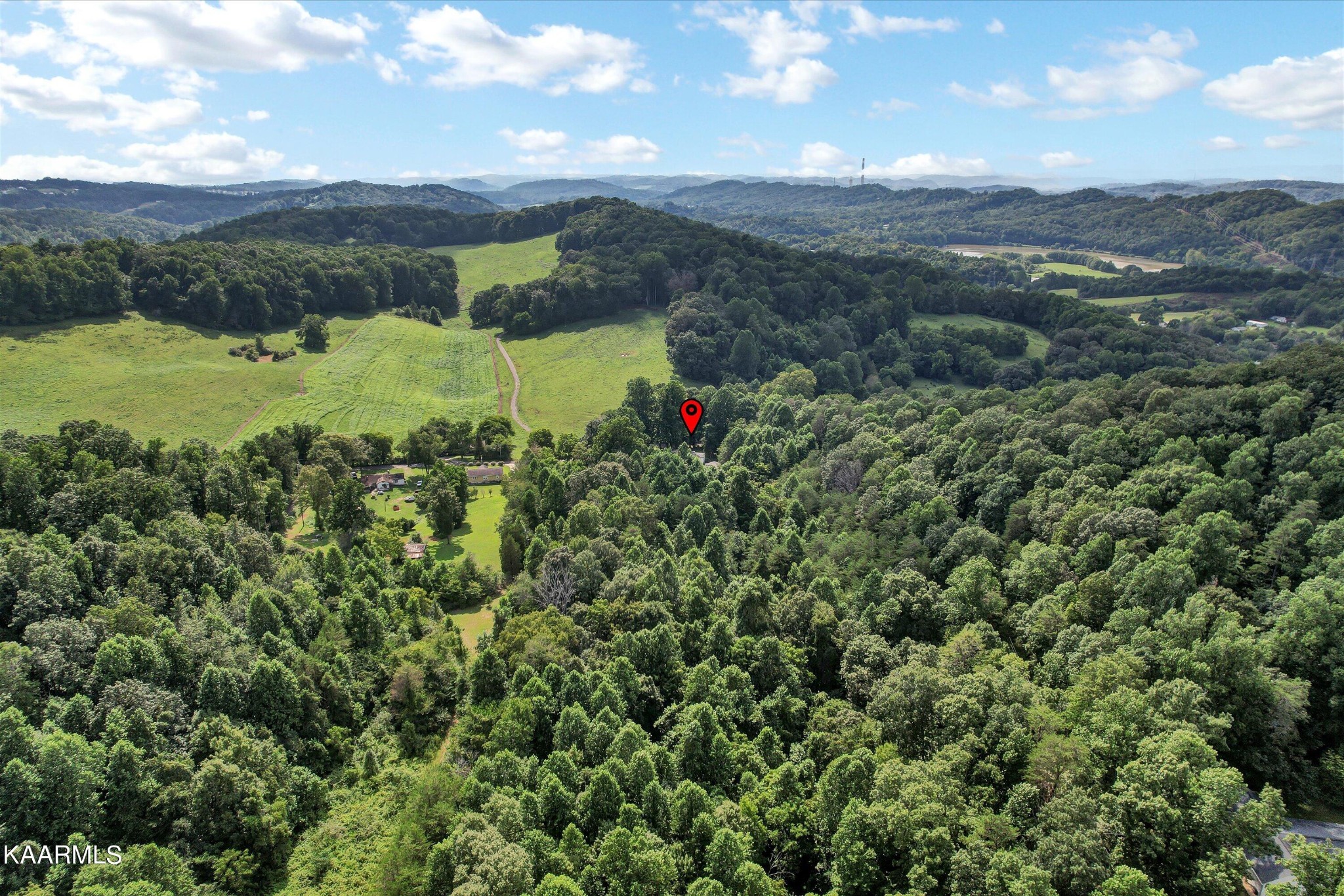185 Moody Hollow Road Powell, TN 37849 - Photo 39 of 46 a view of a lake with a mountain in the background