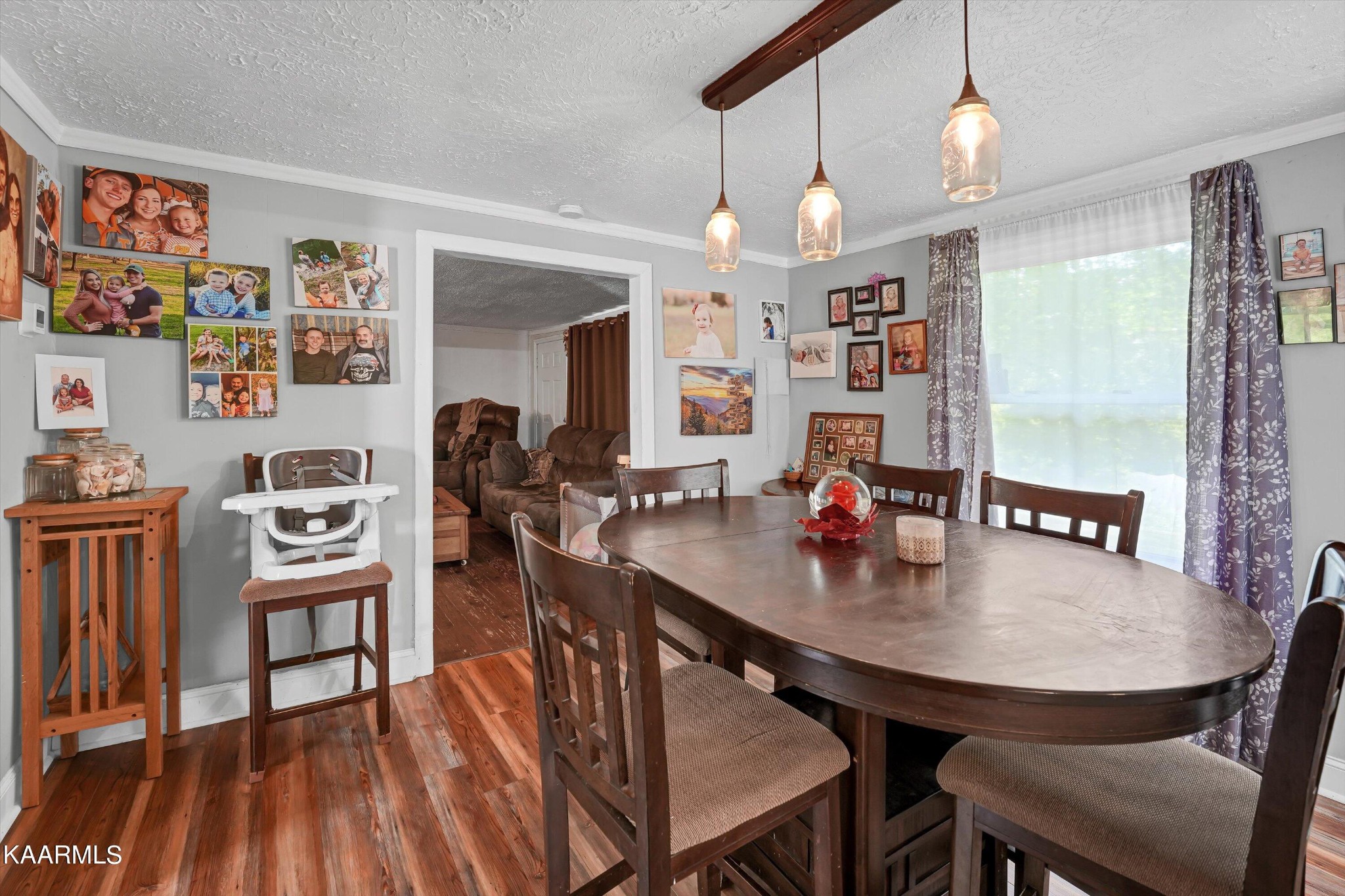 185 Moody Hollow Road Powell, TN 37849 - Photo 8 of 46 a view of a dining room with furniture and a chandelier