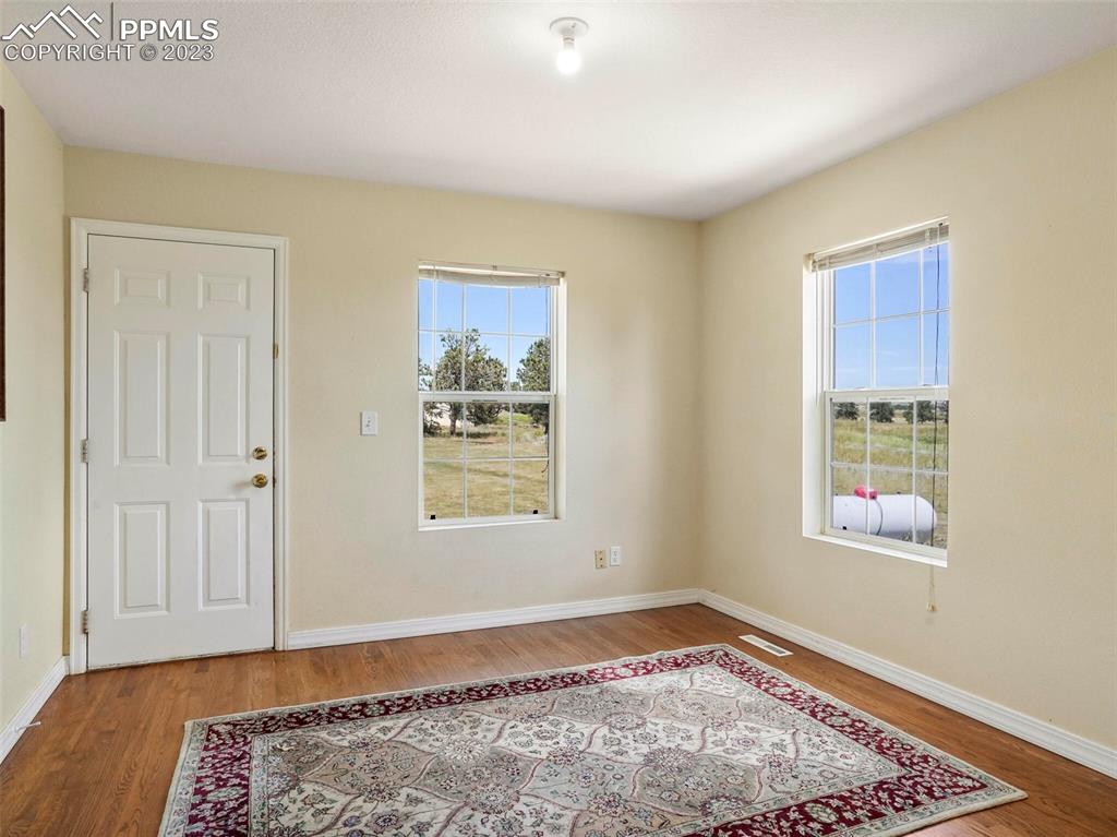 13550 Murphy Road Elbert, CO 80106 - Photo 16 of 42 a view of an empty room and a window
