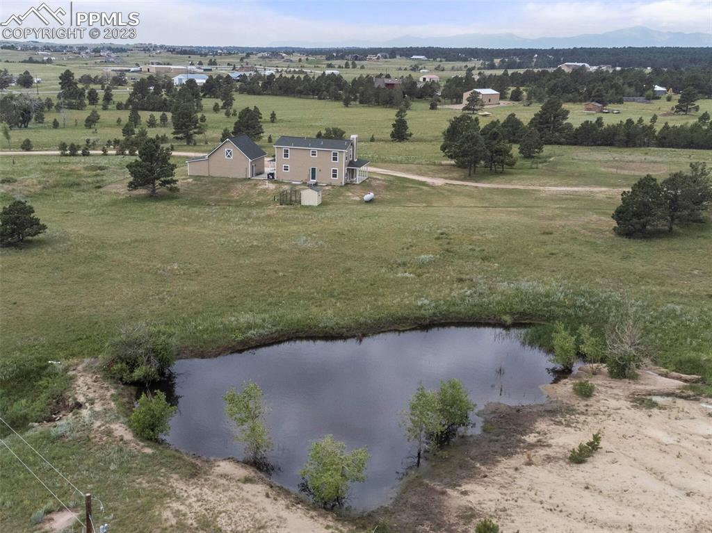 13550 Murphy Road Elbert, CO 80106 - Photo 3 of 42 an aerial view of a house with yard
