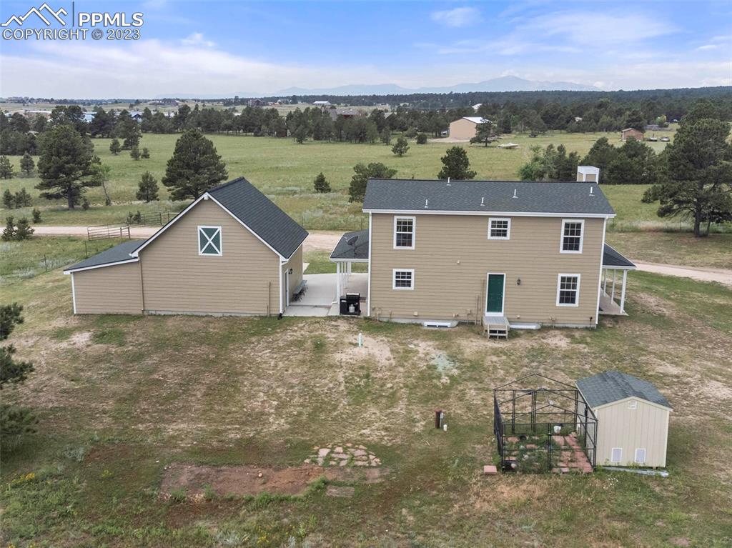 13550 Murphy Road Elbert, CO 80106 - Photo 39 of 42 an aerial view of a house with a yard
