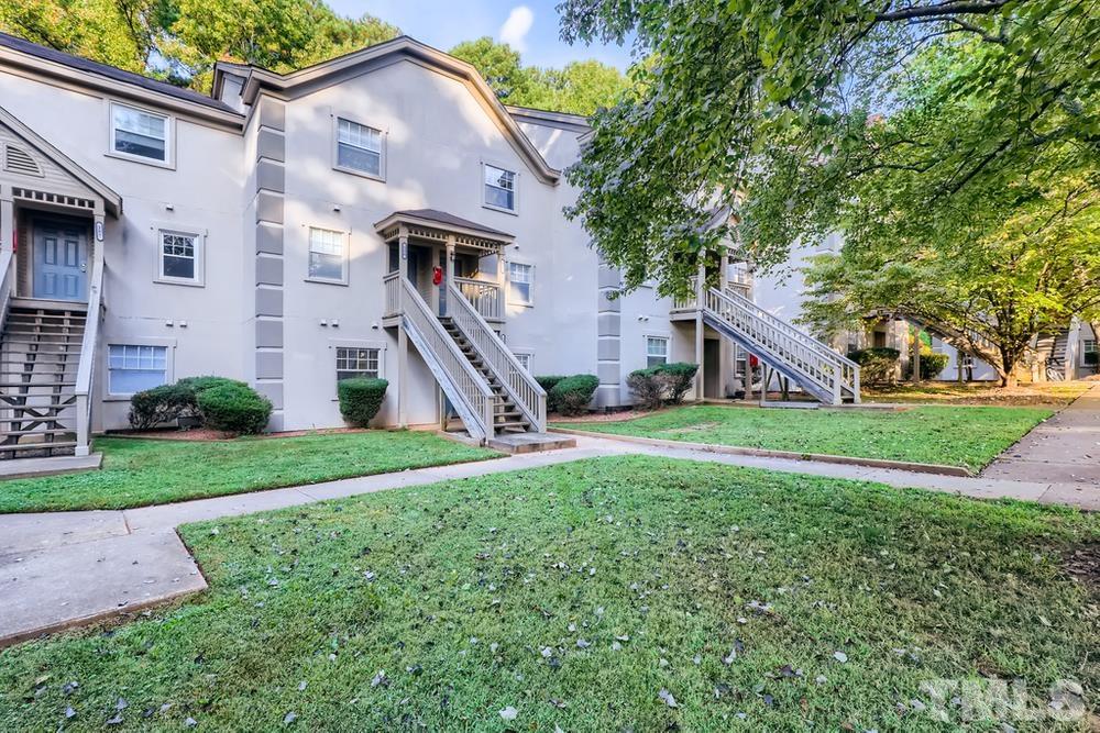 2518 Avent Ferry Road, Unit 103 Raleigh, NC 27606 - Photo 2 of 28 a front view of house with yard and green space