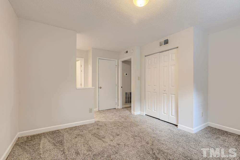 2518 Avent Ferry Road, Unit 103 Raleigh, NC 27606 - Photo 17 of 28 a view of an empty room