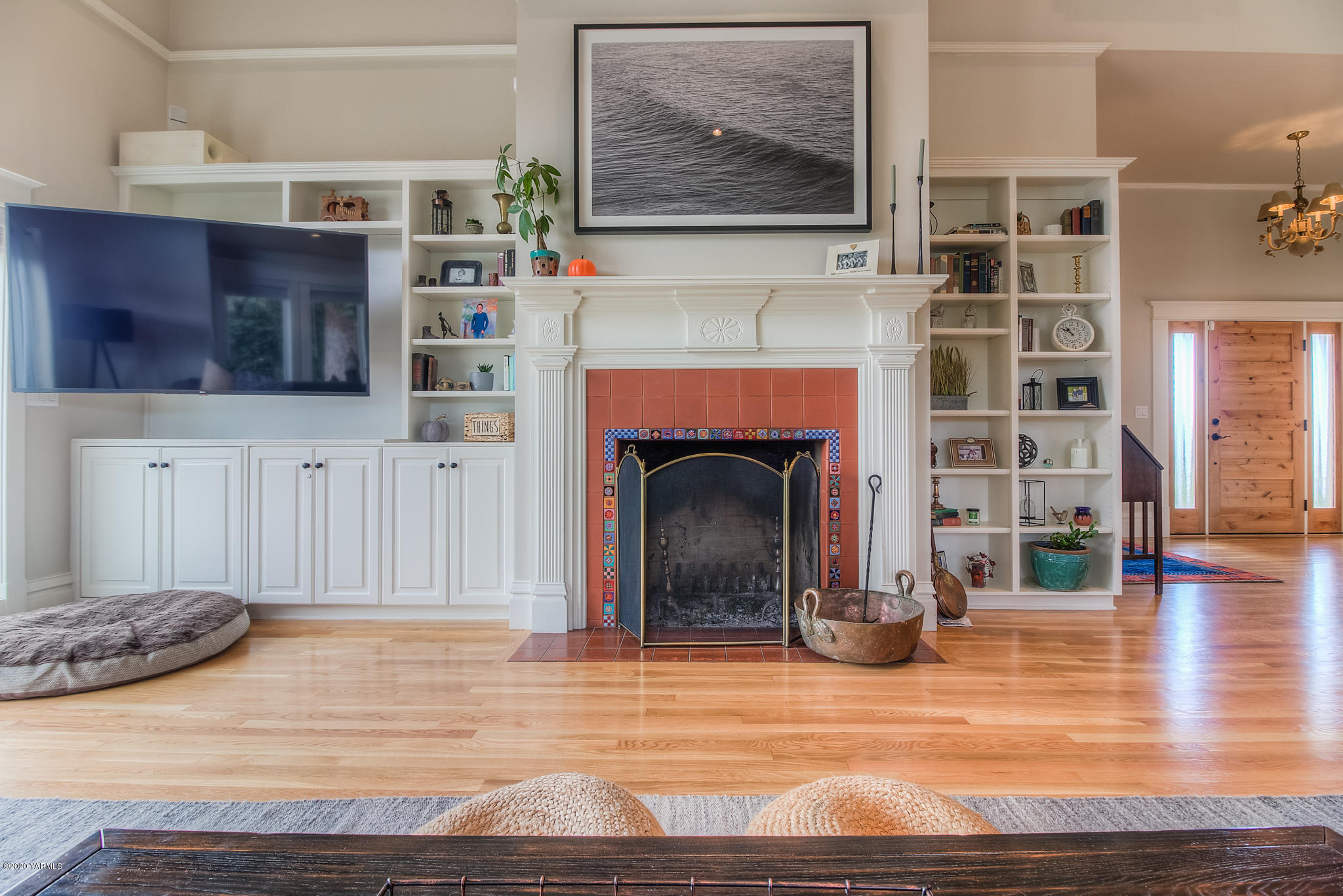 791 Becker Road Toppenish, WA 98948 - Photo 16 of 78 a view of a livingroom with wooden floor and a fireplace