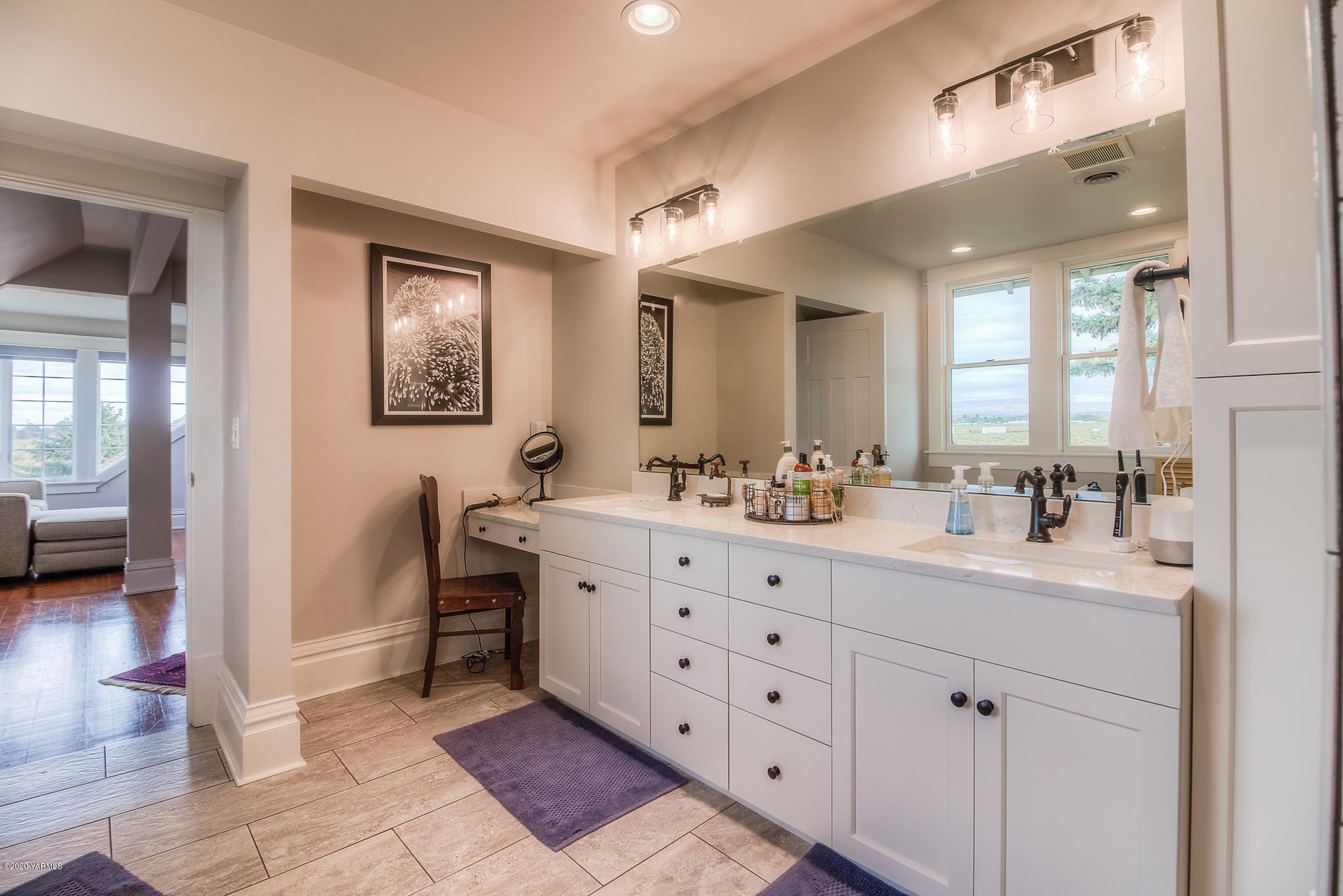 791 Becker Road Toppenish, WA 98948 - Photo 45 of 78 a spacious bathroom with a double vanity sink a mirror and a shower