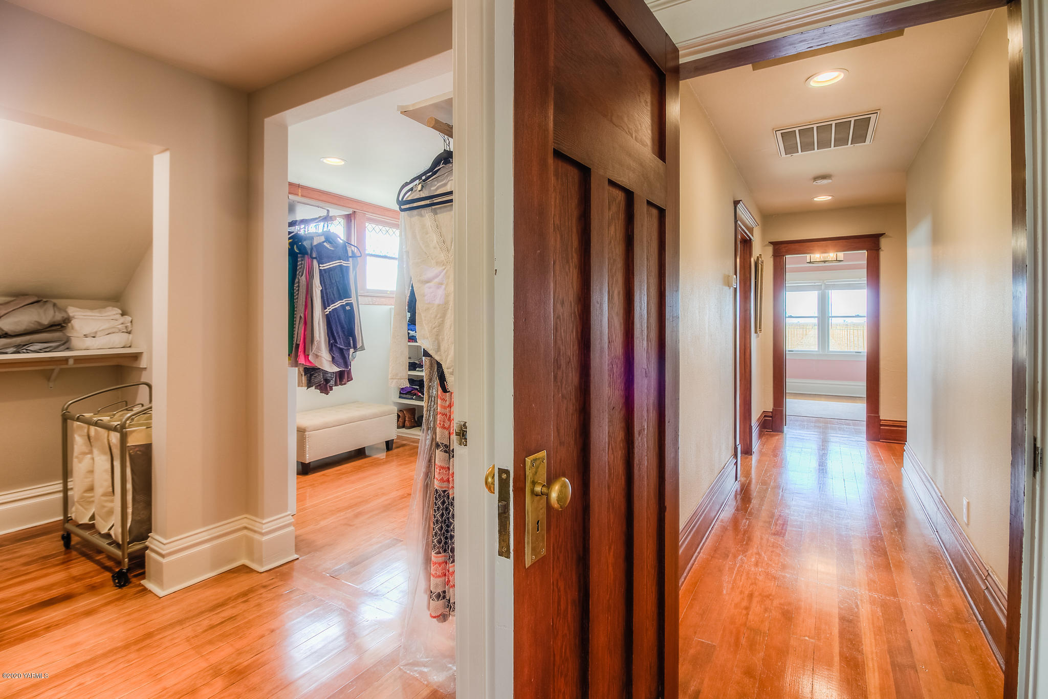 791 Becker Road Toppenish, WA 98948 - Photo 50 of 78 a view of a hallway with wooden floor and living room