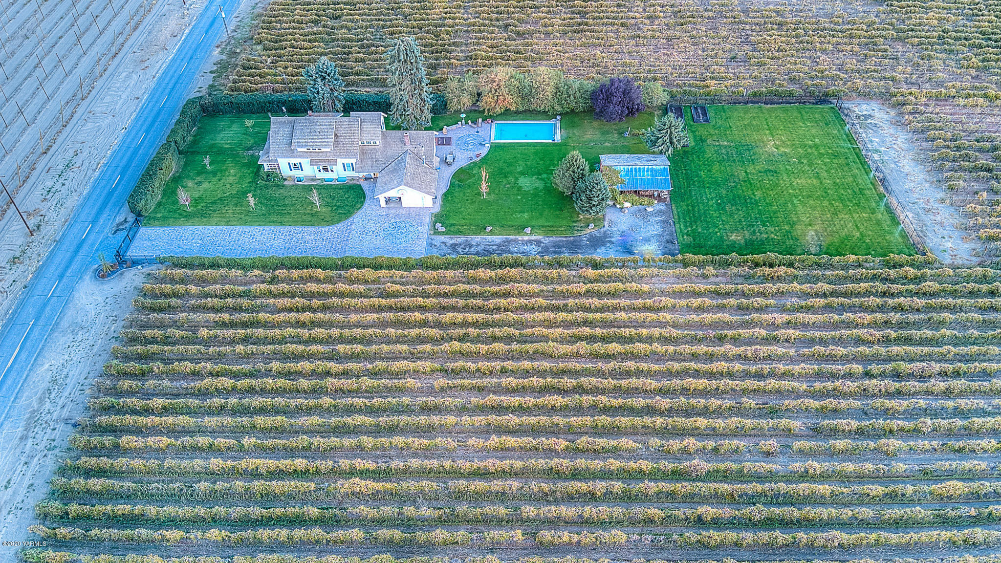 791 Becker Road Toppenish, WA 98948 - Photo 7 of 78 a view of a garden from a window