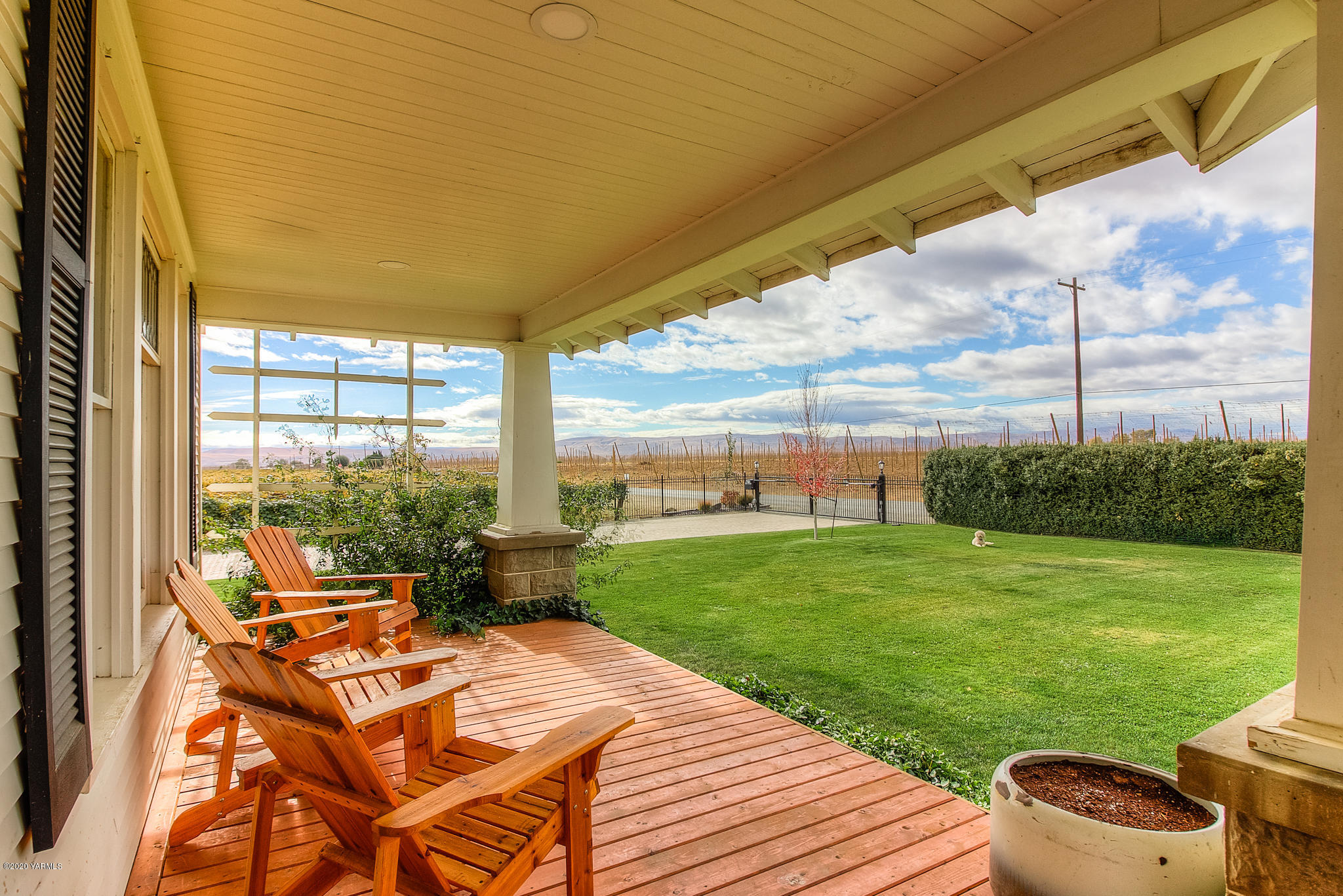 791 Becker Road Toppenish, WA 98948 - Photo 9 of 78 a view of a patio with dining table and chairs