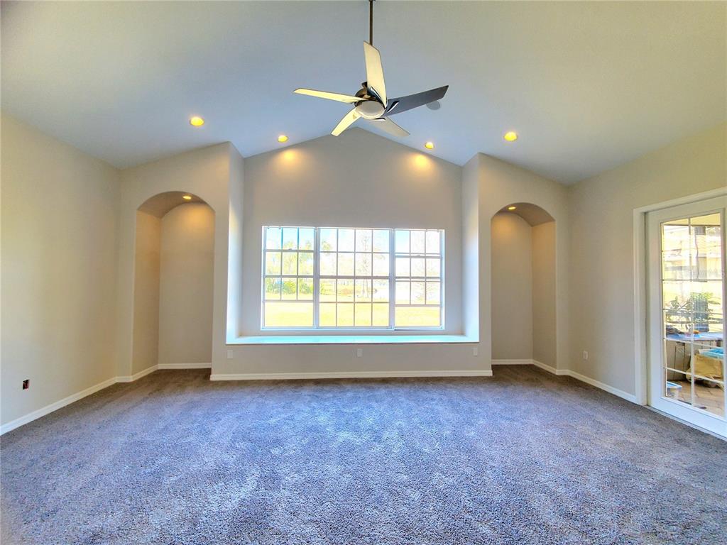10004 Tree Tops Lake Road Tampa, FL 33626 - Photo 45 of 74 a view of an empty room with a window