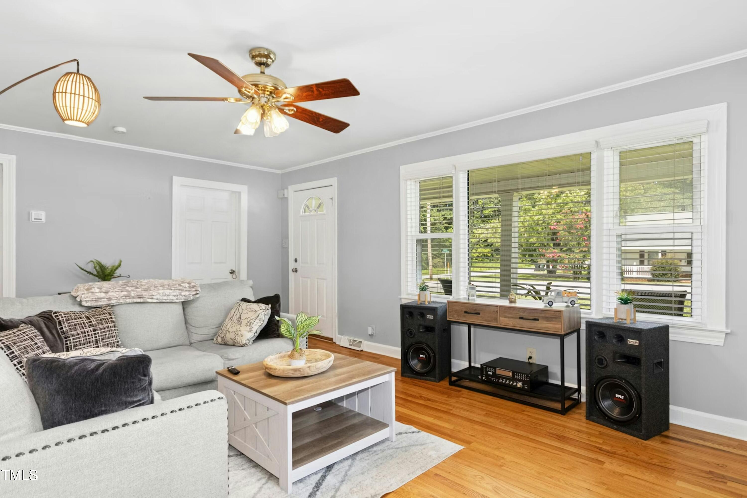 302 North 13th Street Erwin, NC 28339 - Photo 5 of 21 a living room with furniture and a window
