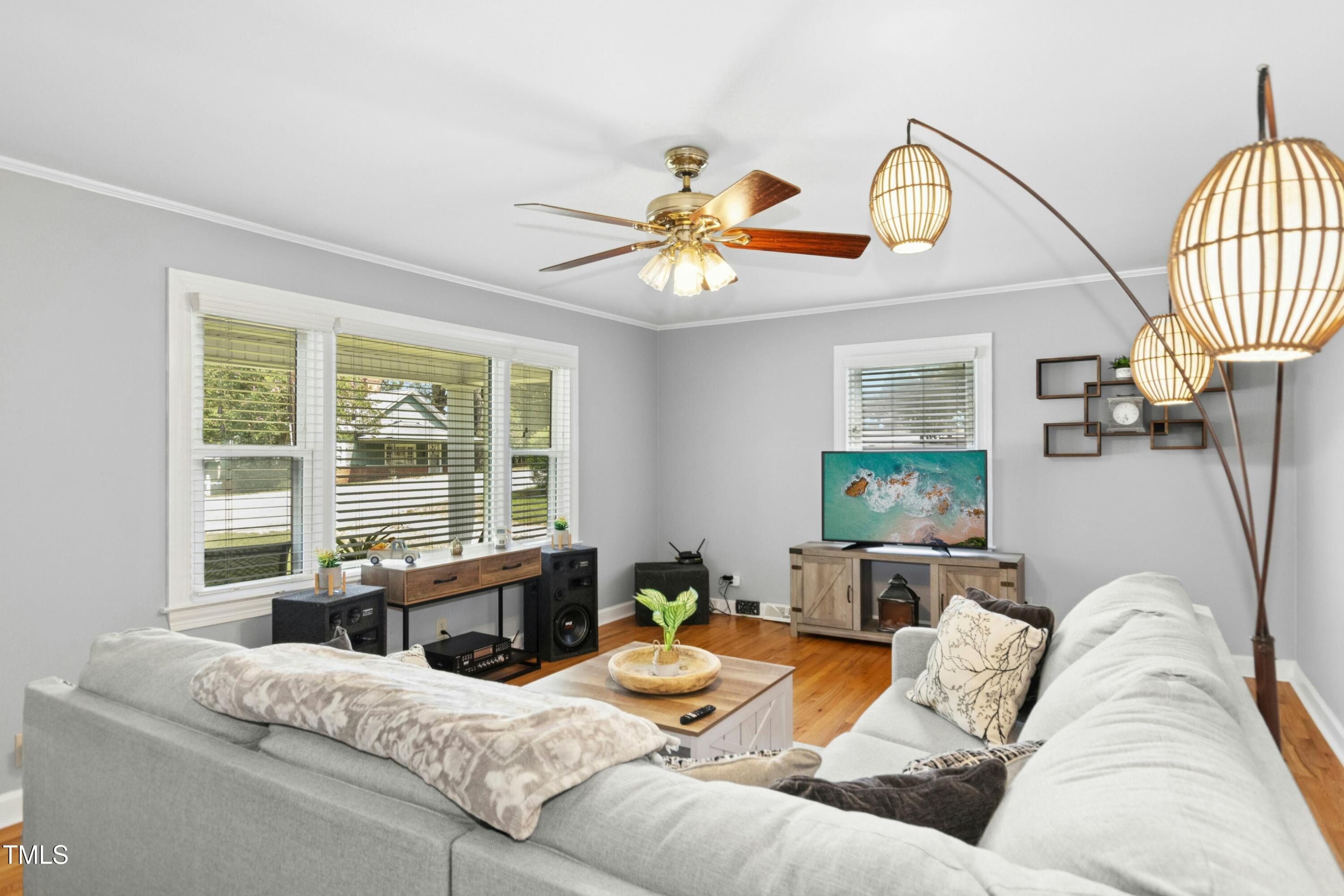 302 North 13th Street Erwin, NC 28339 - Photo 6 of 21 a living room with furniture and a large window