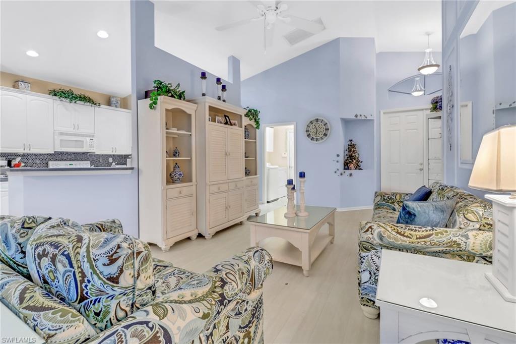 9054 Springview Loop Estero, FL 33928 - Photo 3 of 24 a living room with furniture