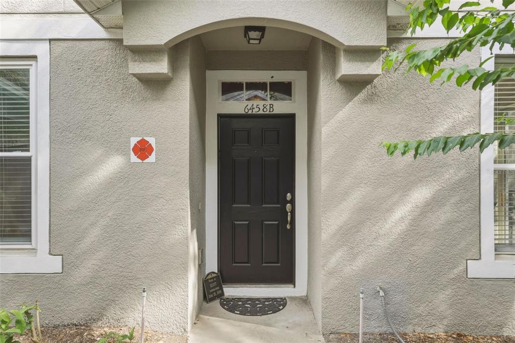 6458 South Goldenrod Road, Unit 29B Orlando, FL 32822 - Photo 3 of 40 a front view of a house