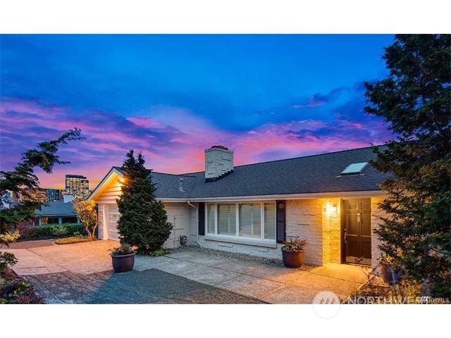 9631 Hilltop Road Bellevue, WA 98004 - Photo 1 of 17 a view of a house with a yard
