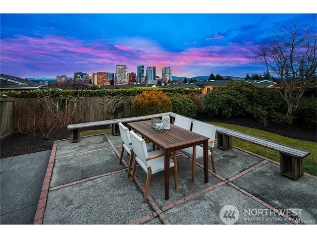 9631 Hilltop Road Bellevue, WA 98004 - Photo 14 of 17 a view of a terrace with sitting area
