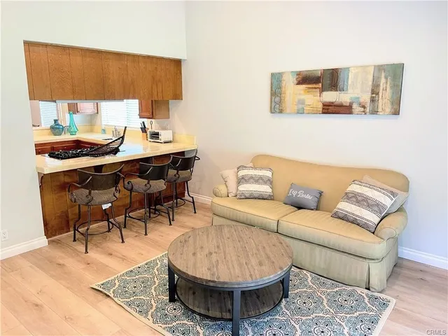 a living room with a couch and a table