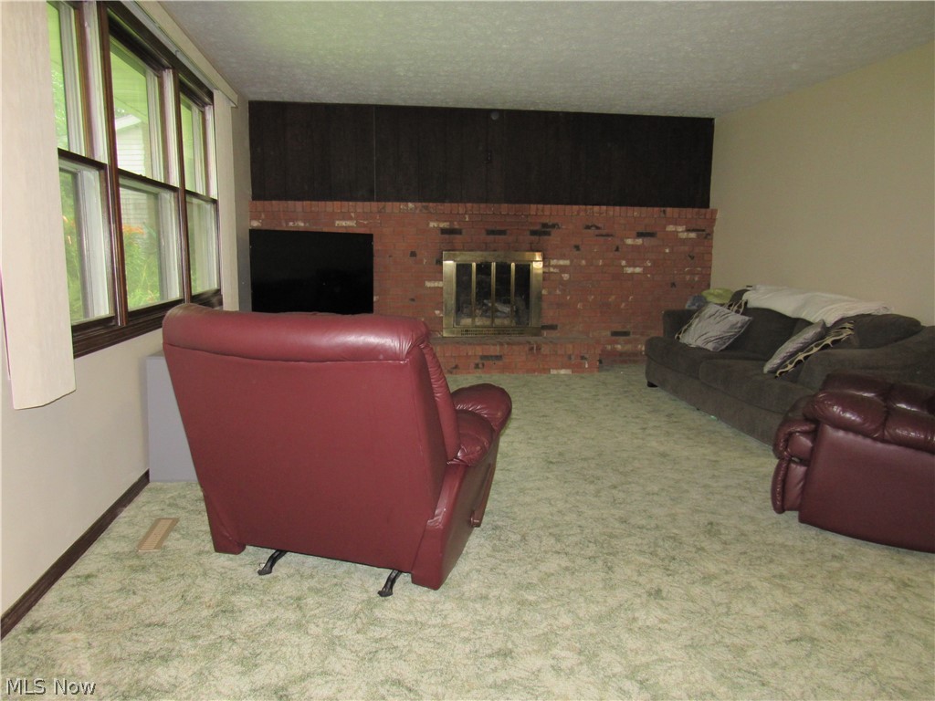 4414 South Ridge Road East Ashtabula, OH 44004 - Photo 13 of 26 View of living room from front door. Not pictured by the front door is a coat closet