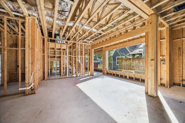 a view of a hall with wooden floor
