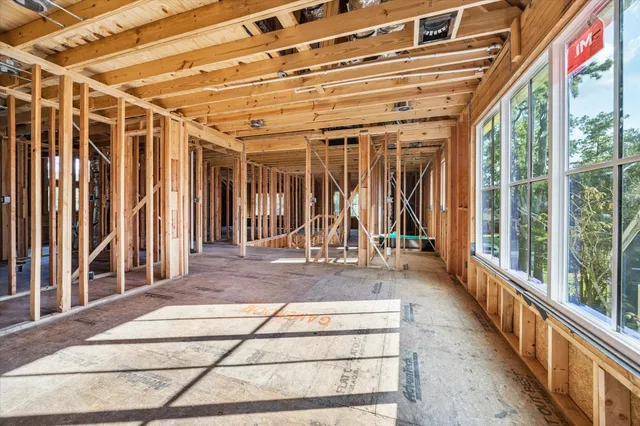 a view of a porch with wooden floor and stairs
