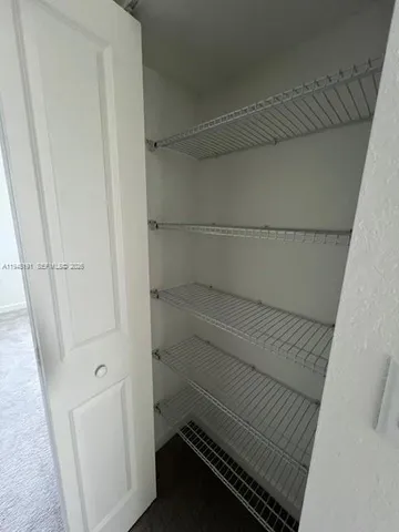 a view of storage and utility room