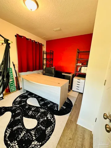 a table with chairs and a stove