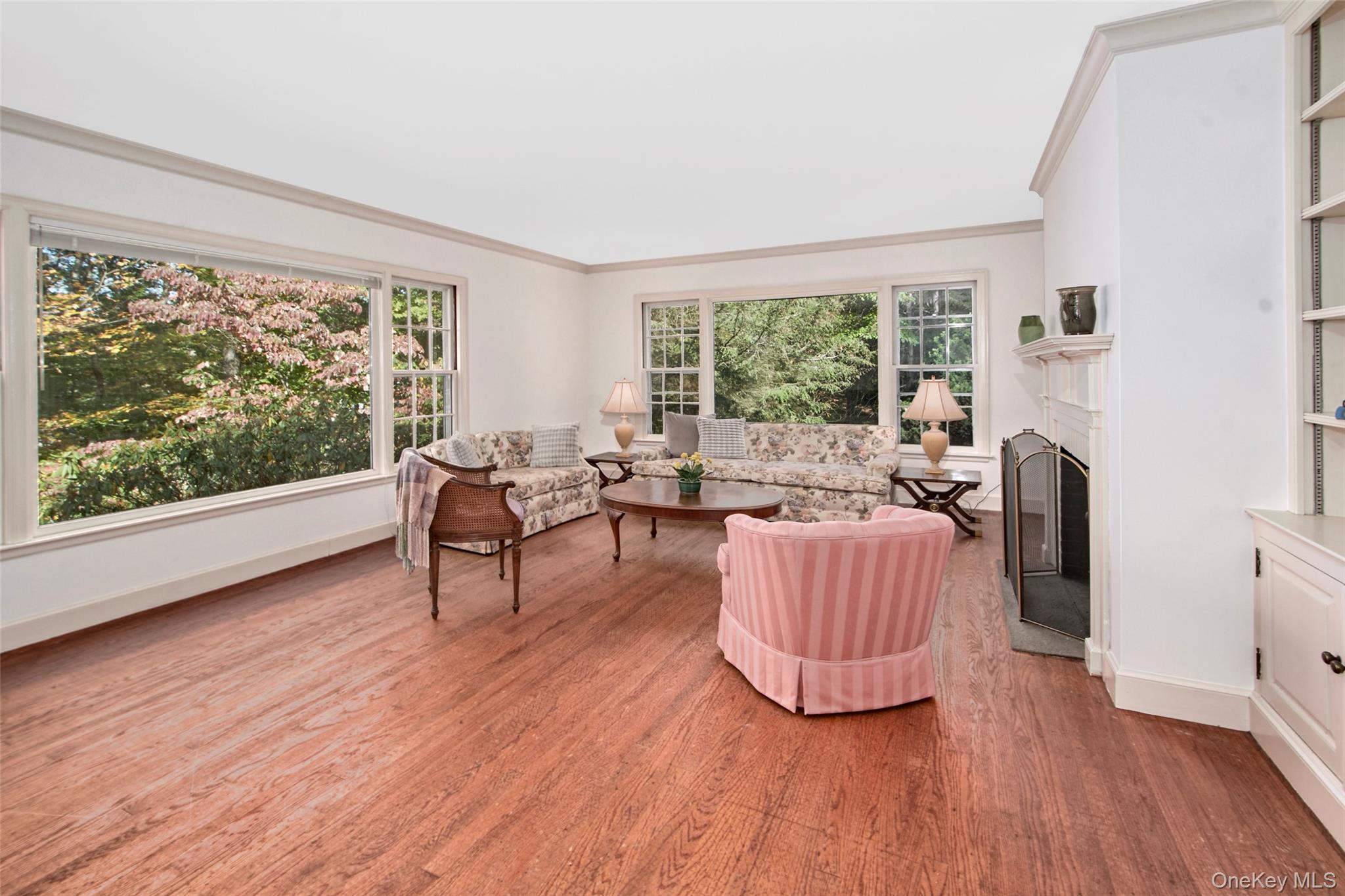 71 Commodore Road Chappaqua, NY 10514 - Photo 14 of 39 a living room with furniture and a large window