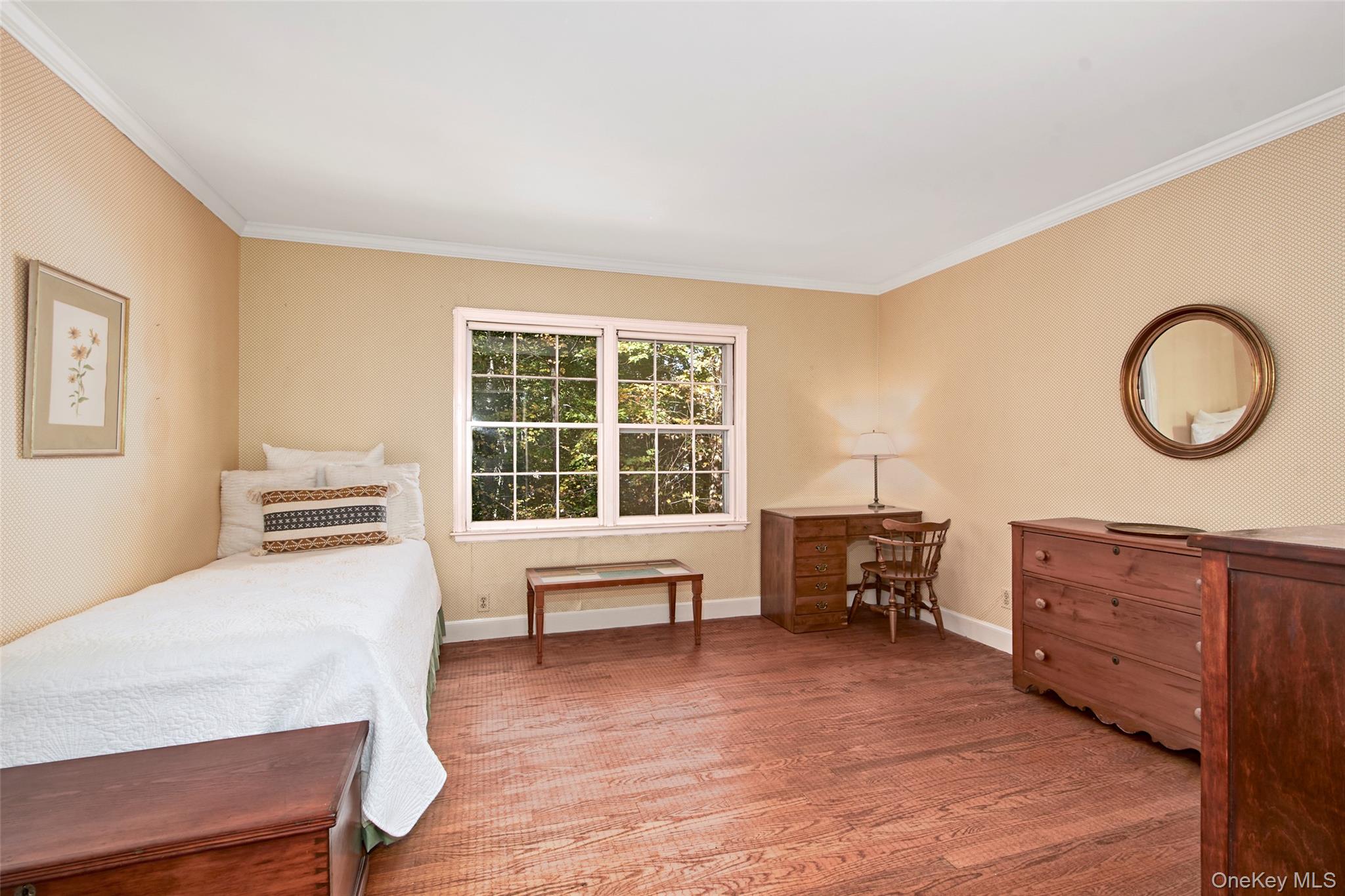 71 Commodore Road Chappaqua, NY 10514 - Photo 18 of 39 a view of a livingroom with furniture cabinet and a window