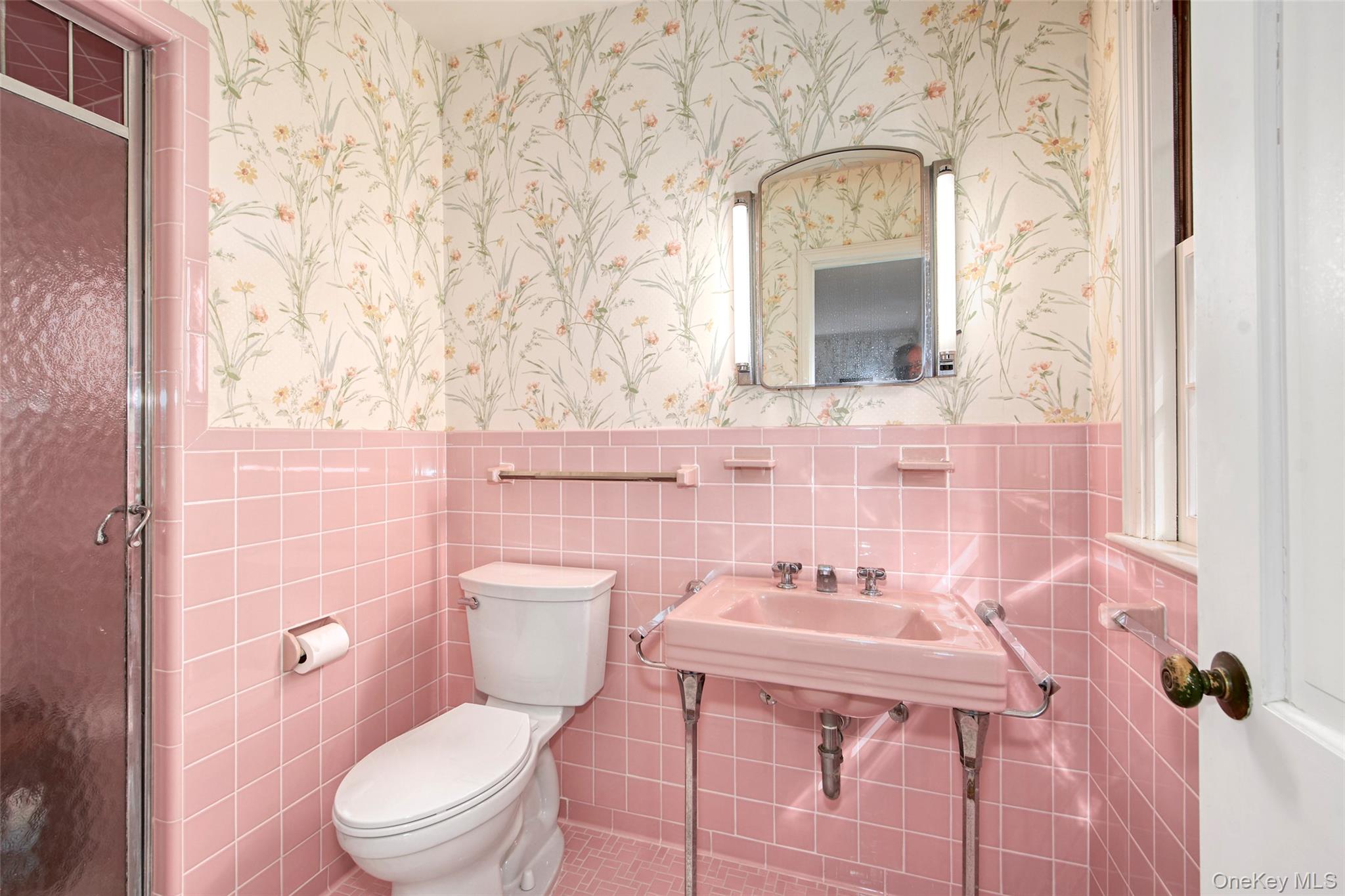 71 Commodore Road Chappaqua, NY 10514 - Photo 22 of 39 a white toilet sitting next to a bathroom sink