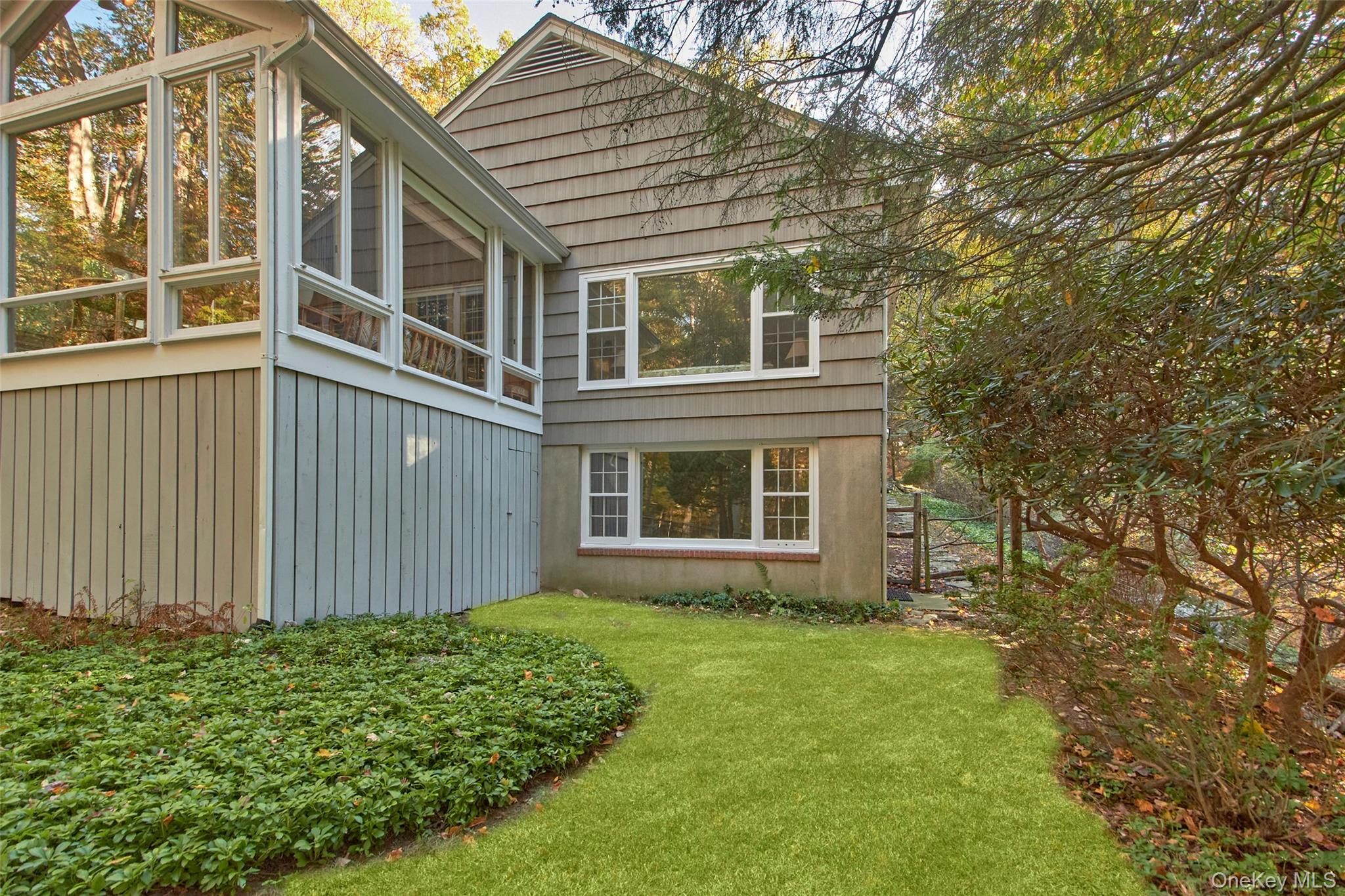 71 Commodore Road Chappaqua, NY 10514 - Photo 32 of 39 front view of house with a yard
