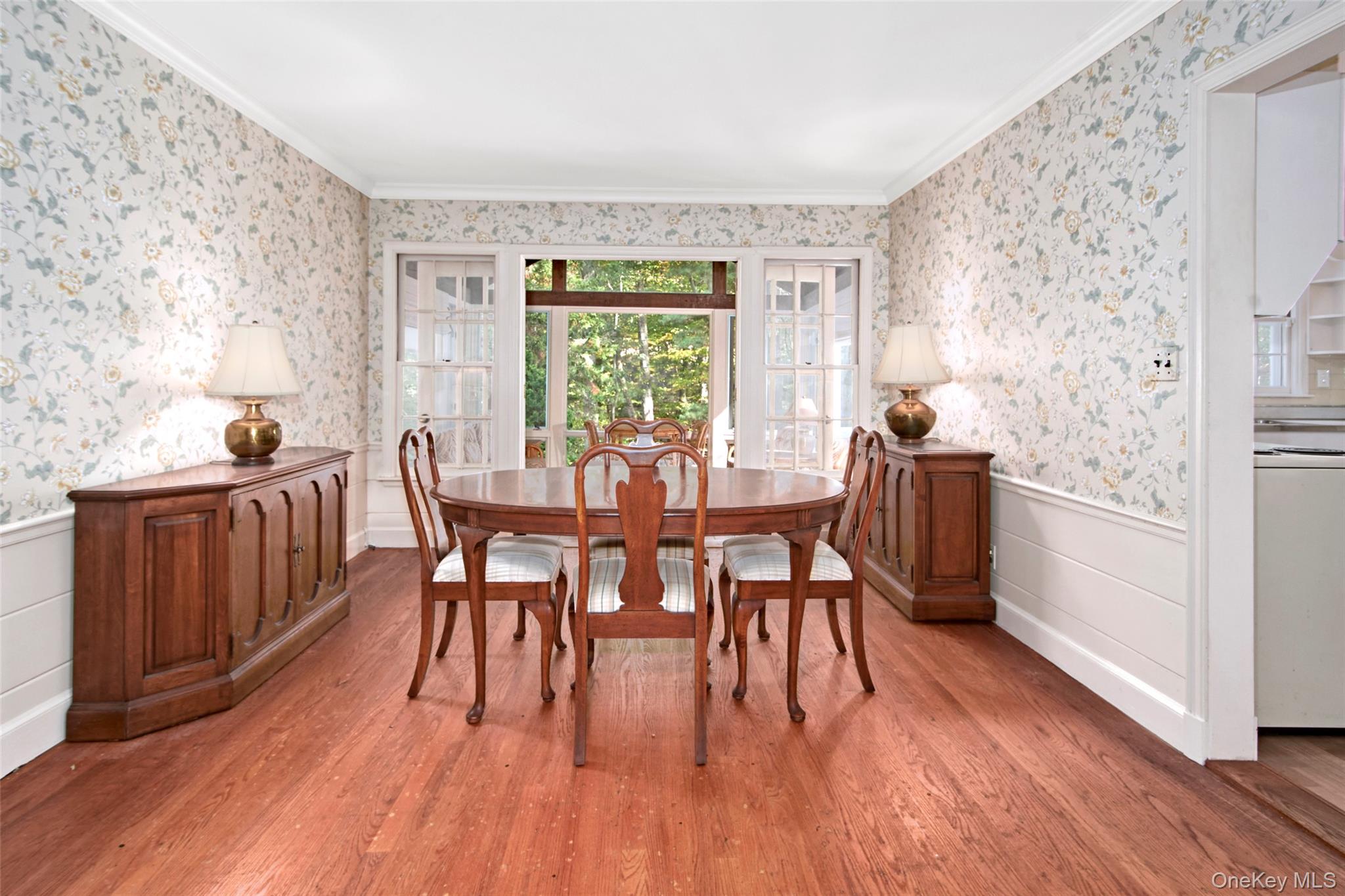71 Commodore Road Chappaqua, NY 10514 - Photo 5 of 39 a view of a dining room with furniture and wooden floor