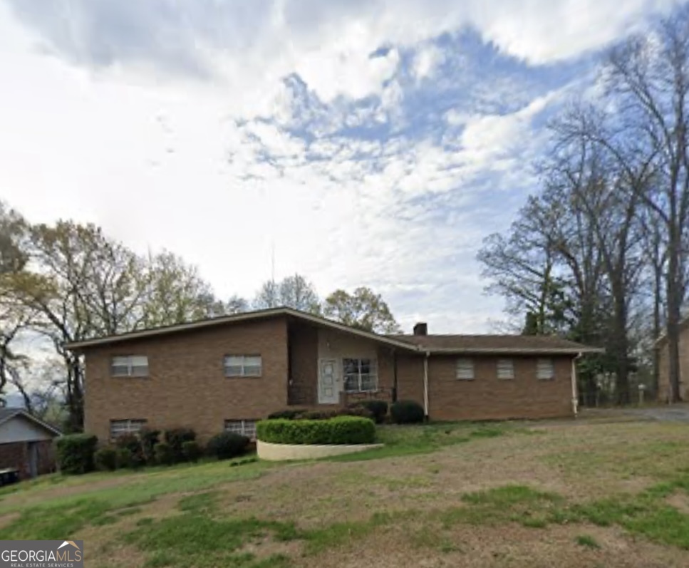 111 Deerbrook Drive Rome, GA 30165 - Photo 1 of 1 a view of a backyard of the house