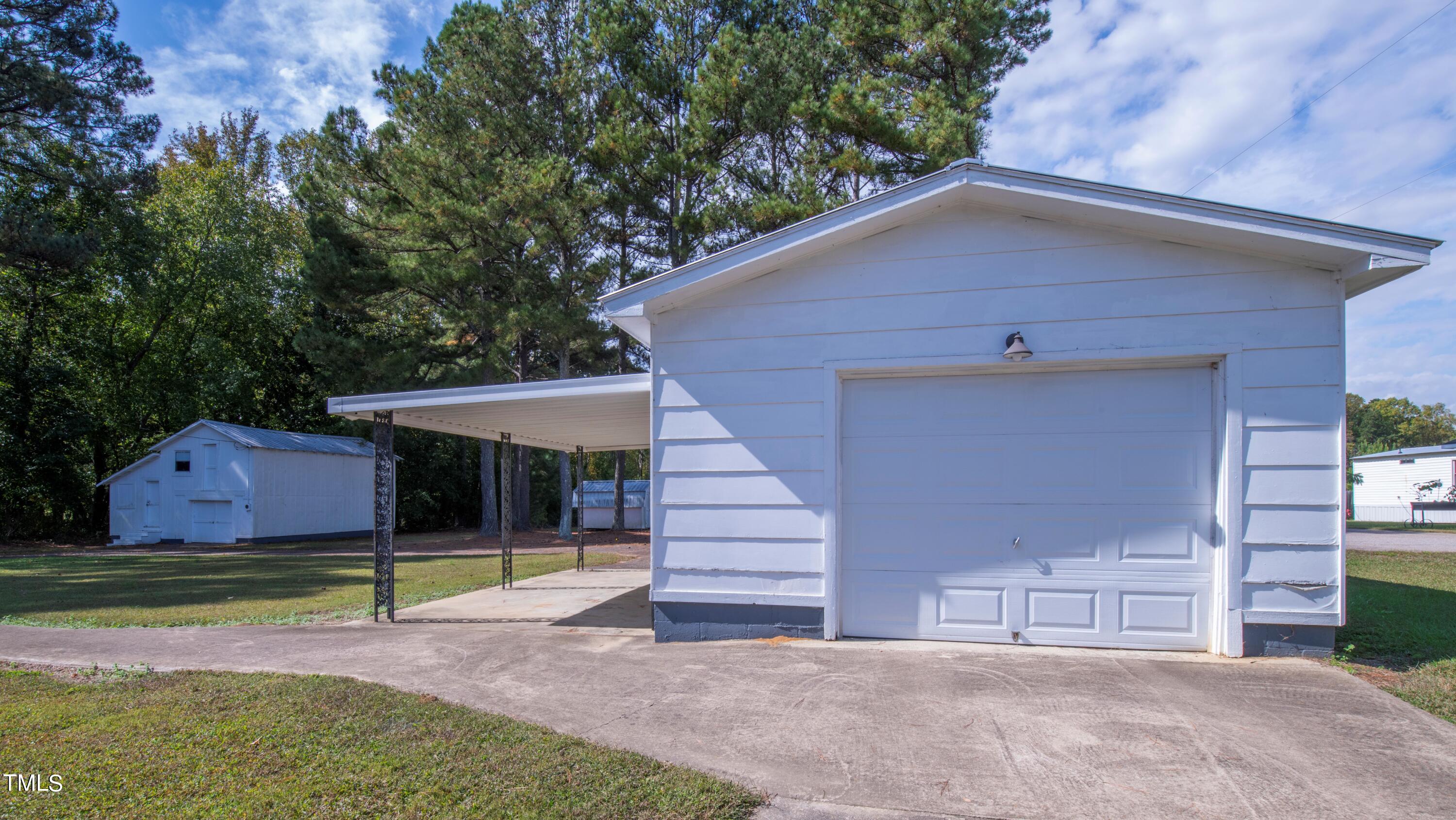 4180 Brantley Road Zebulon, NC 27597 - Photo 2 of 15 a view of a house with a yard