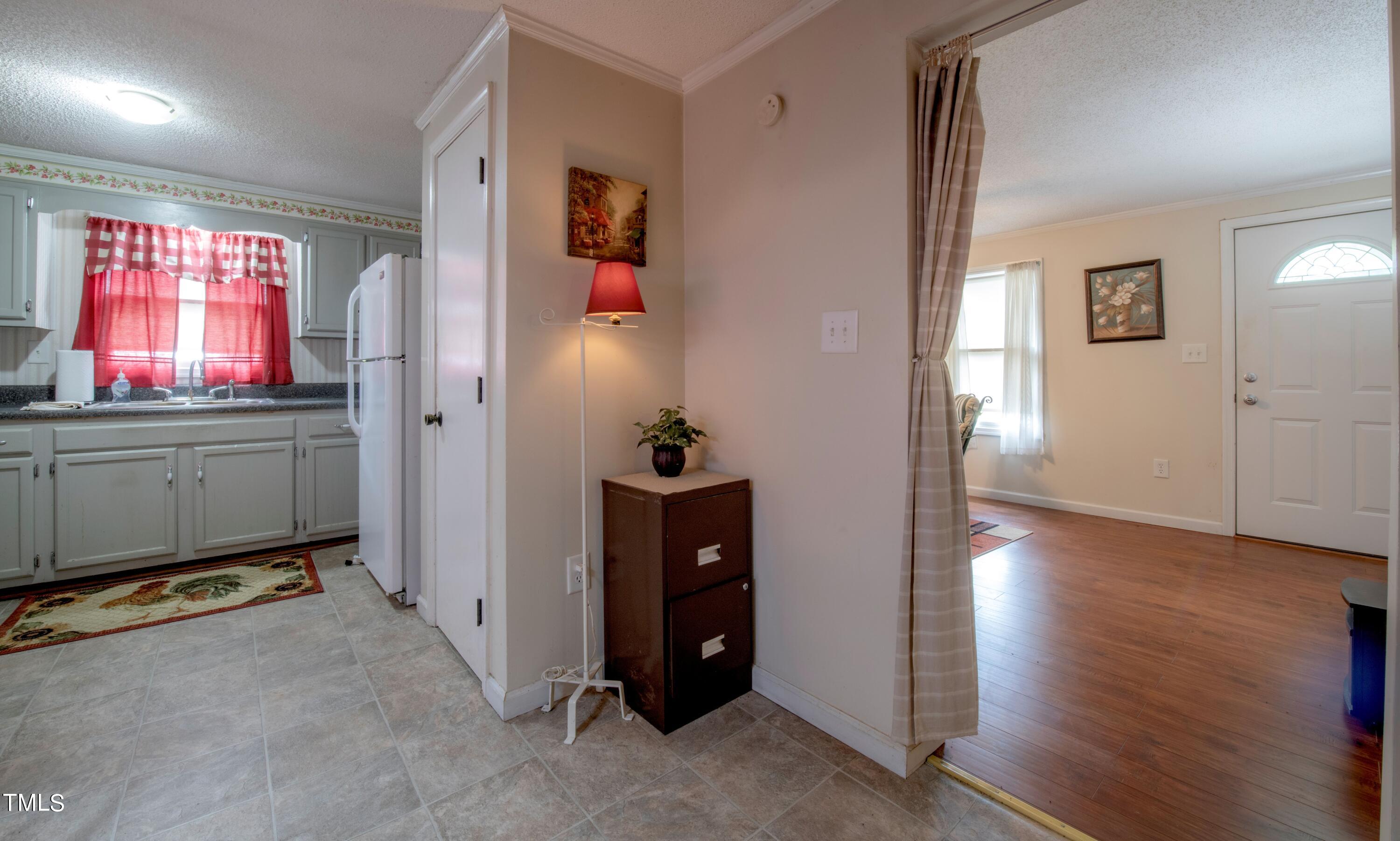 4180 Brantley Road Zebulon, NC 27597 - Photo 8 of 15 wooden floor and windows in a room