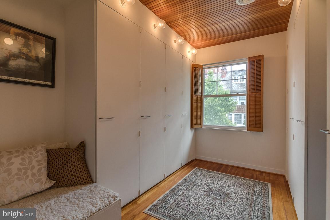 3924 Cloverhill Road Baltimore, MD 21218 - Photo 16 of 30 a view of room with window and wooden floor