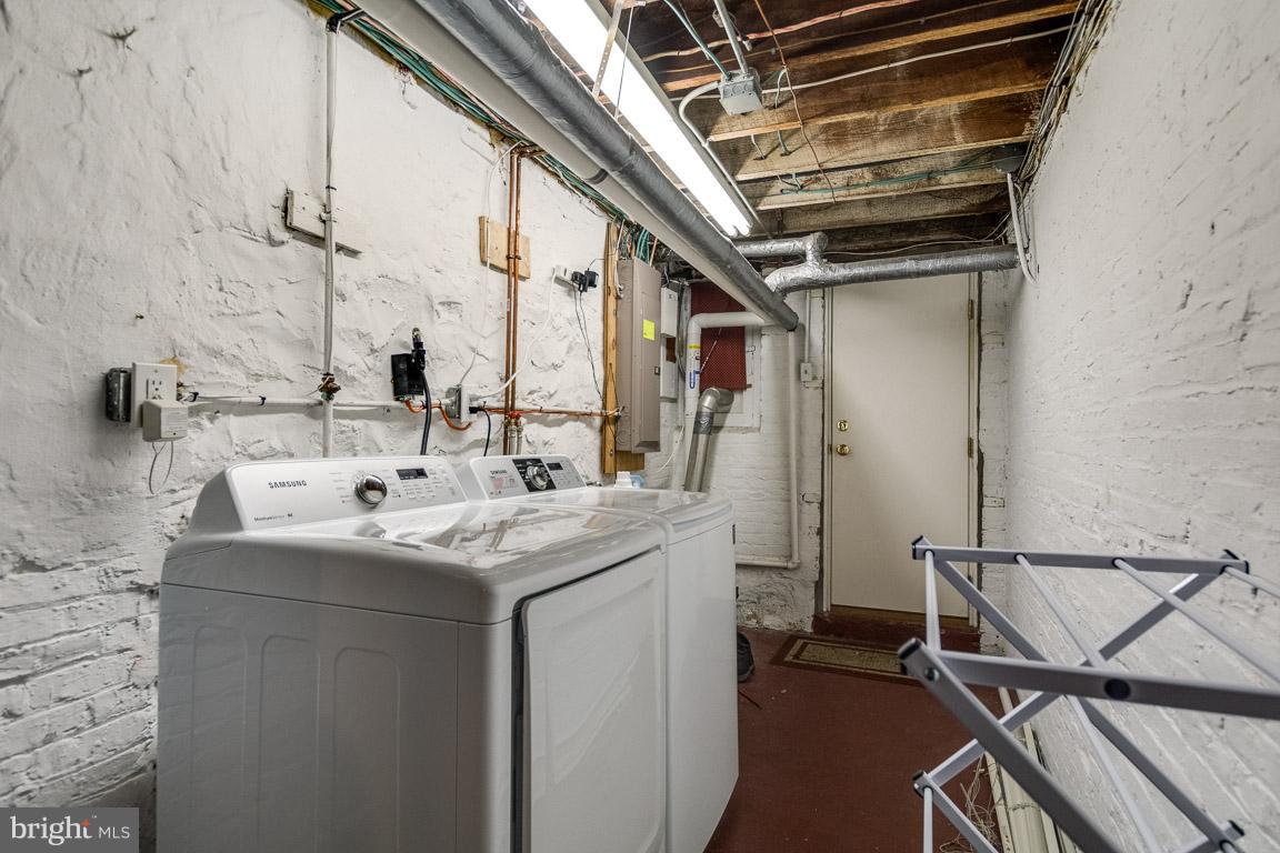 3924 Cloverhill Road Baltimore, MD 21218 - Photo 23 of 30 a utility room with a washer and dryer