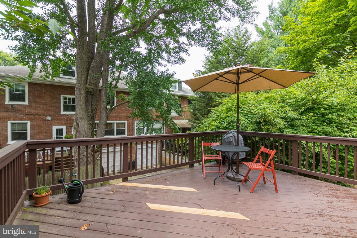 3924 Cloverhill Road Baltimore, MD 21218 - Photo 25 of 30 a view of balcony with wooden floor and outdoor seating