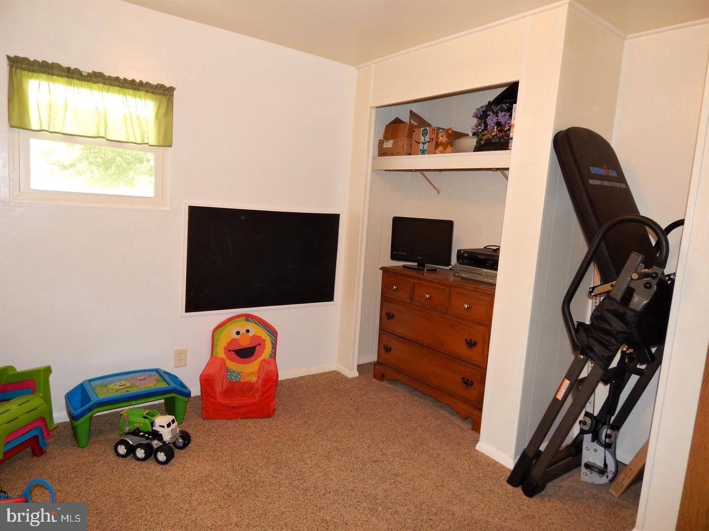 1711 Burkholder Road Red Lion, PA 17356 - Photo 12 of 24 a bedroom with furniture and a window