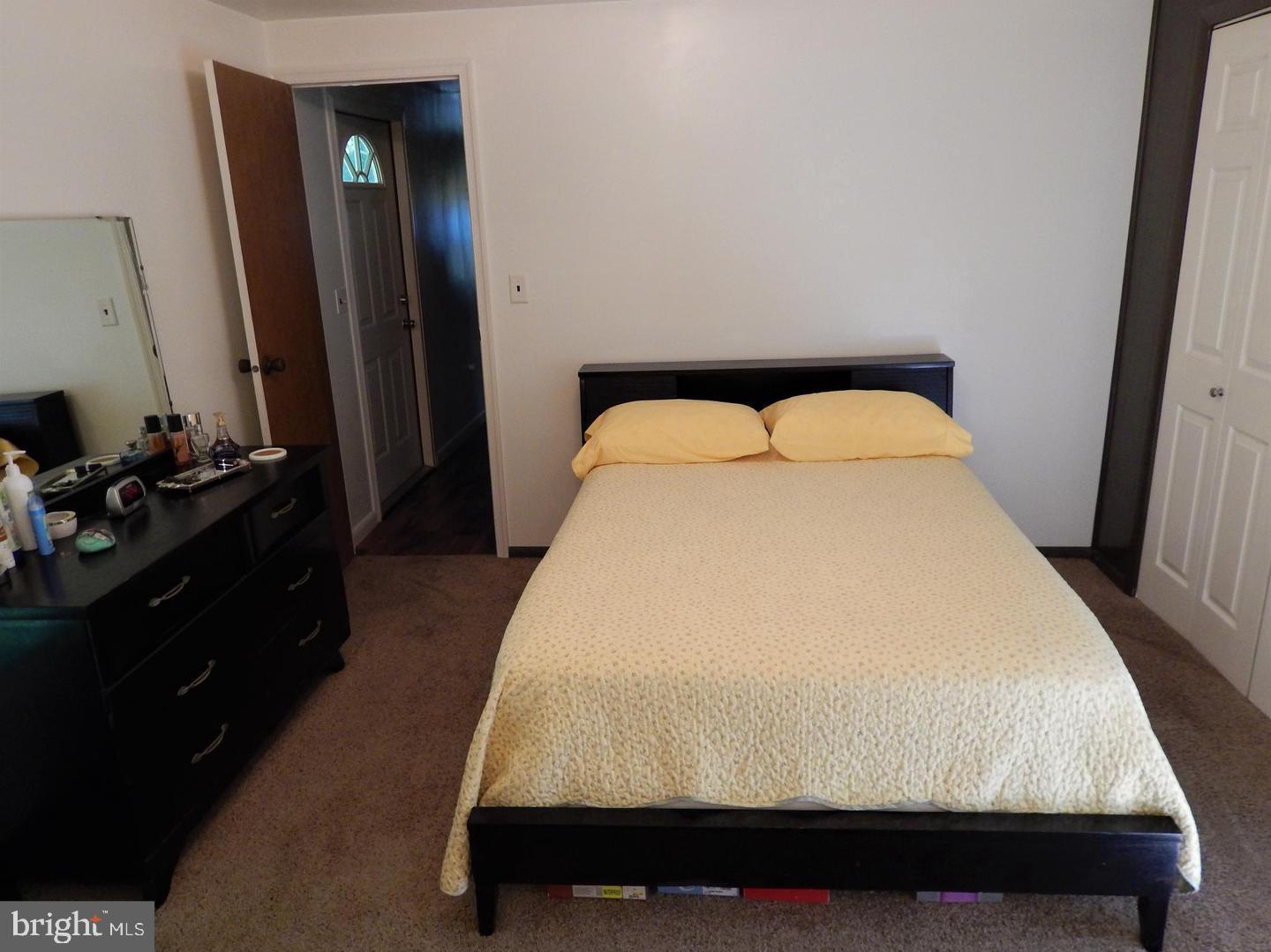 1711 Burkholder Road Red Lion, PA 17356 - Photo 16 of 24 a large bed sitting in a bedroom next to a window