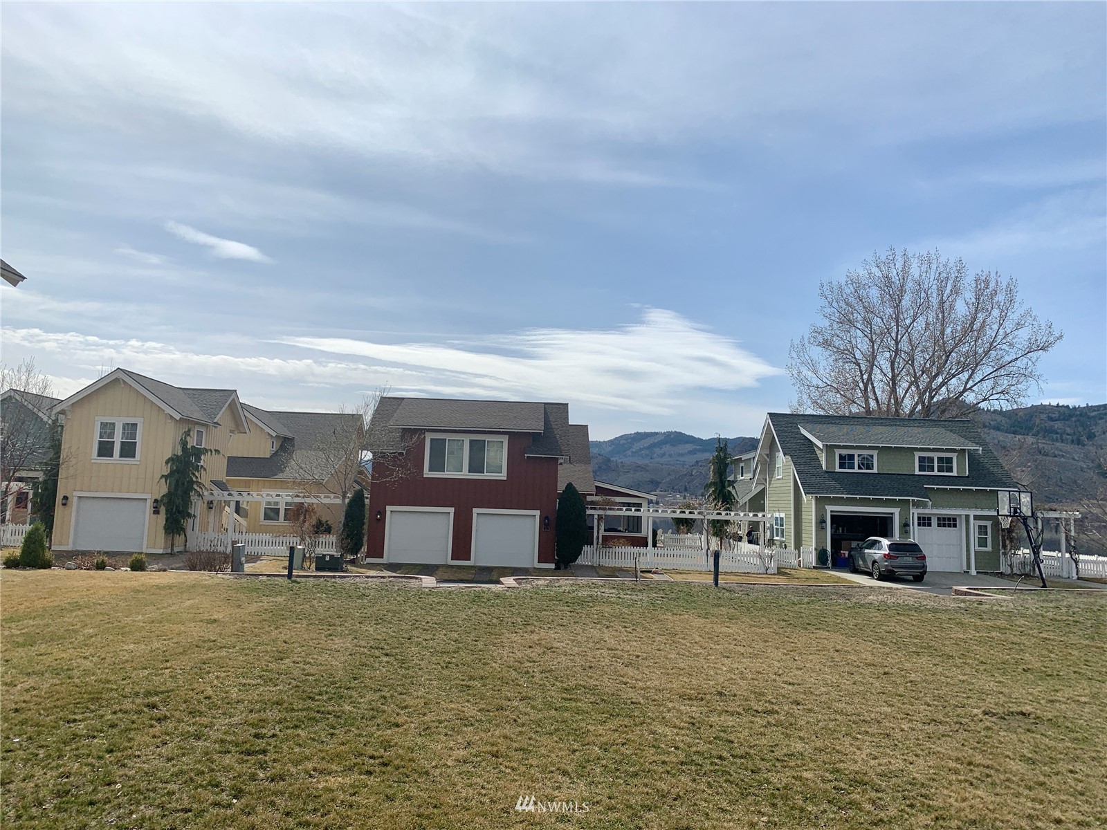 94 Veranda Drive Oroville, WA 98844 - Photo 1 of 11 a aerial view of a house with a yard and balcony