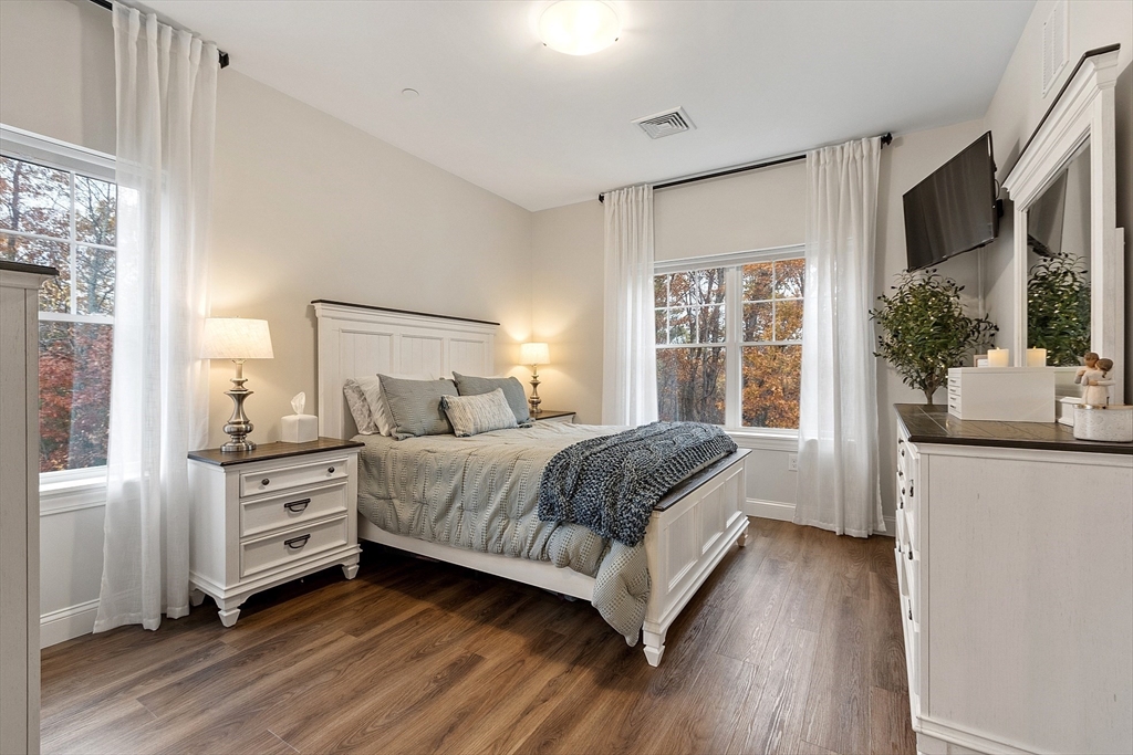 3202 Briarwood Village, Unit 3202 Clinton, MA 01510 - Photo 19 of 35 a bedroom with a large bed and a view of bedroom