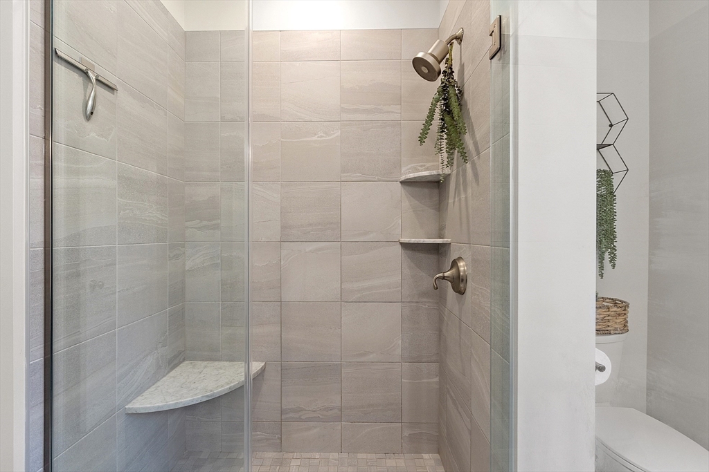 3202 Briarwood Village, Unit 3202 Clinton, MA 01510 - Photo 23 of 35 a bathroom with a shower