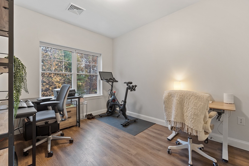 3202 Briarwood Village, Unit 3202 Clinton, MA 01510 - Photo 26 of 35 a view of a workspace with furniture and a window