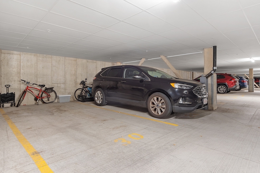 3202 Briarwood Village, Unit 3202 Clinton, MA 01510 - Photo 32 of 35 a view of a car in garage