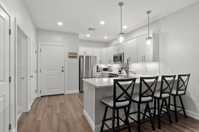 a view of kitchen and dining area